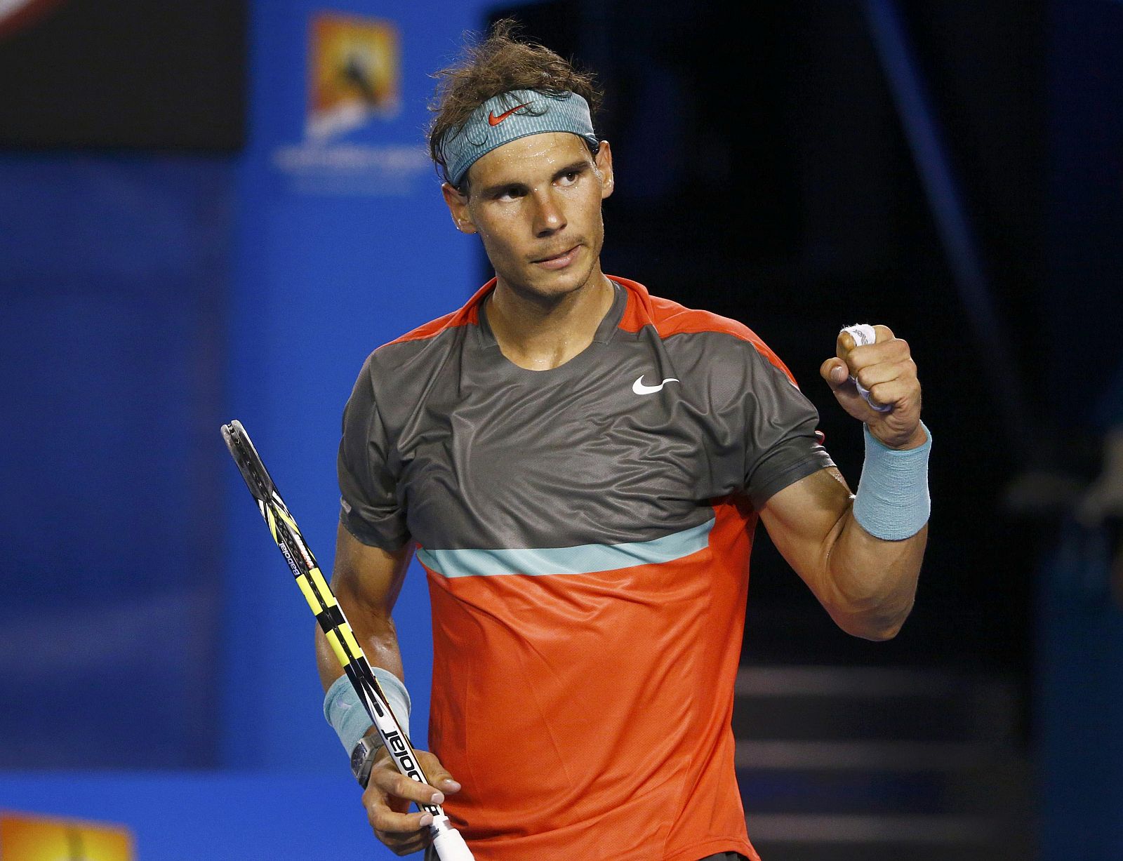 Rafael Nadal of Spain celebrates defeating Thanasi Kokkinakis of Australia during their men's singles match at the Australian Open 2014 tennis tournament in Melbourne