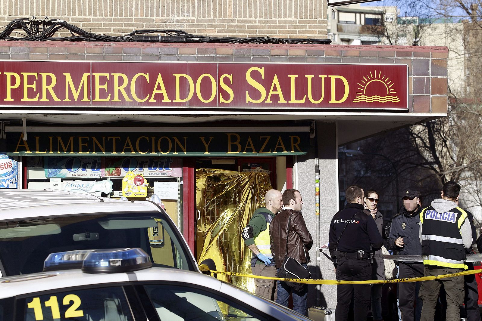 Muere una mujer china asesinada de un disparo en una tienda de alimentación en Madrid