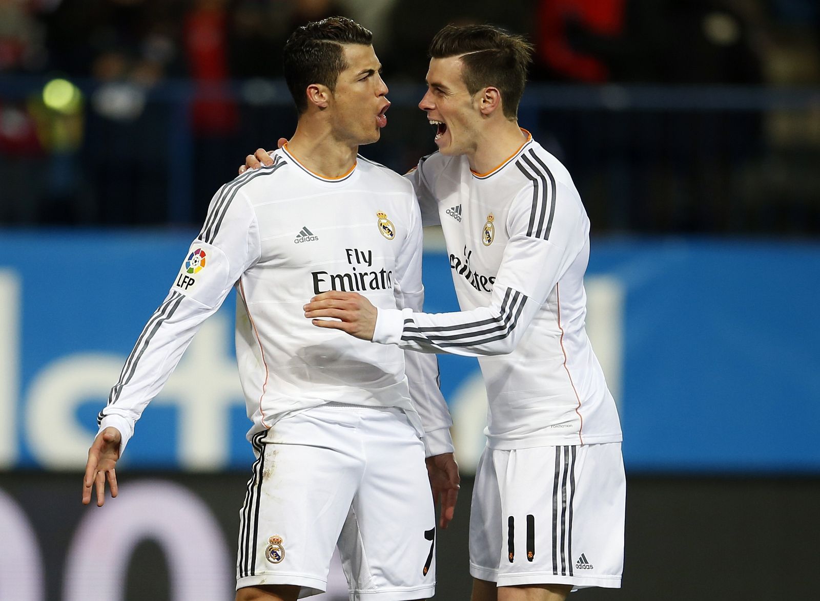 Real Madrid's Ronaldo celebrates with teammate Gareth Bale after scoring a penalty against Atletico Madrid during their Spanish King's Cup semi-final second leg soccer match in Madrid