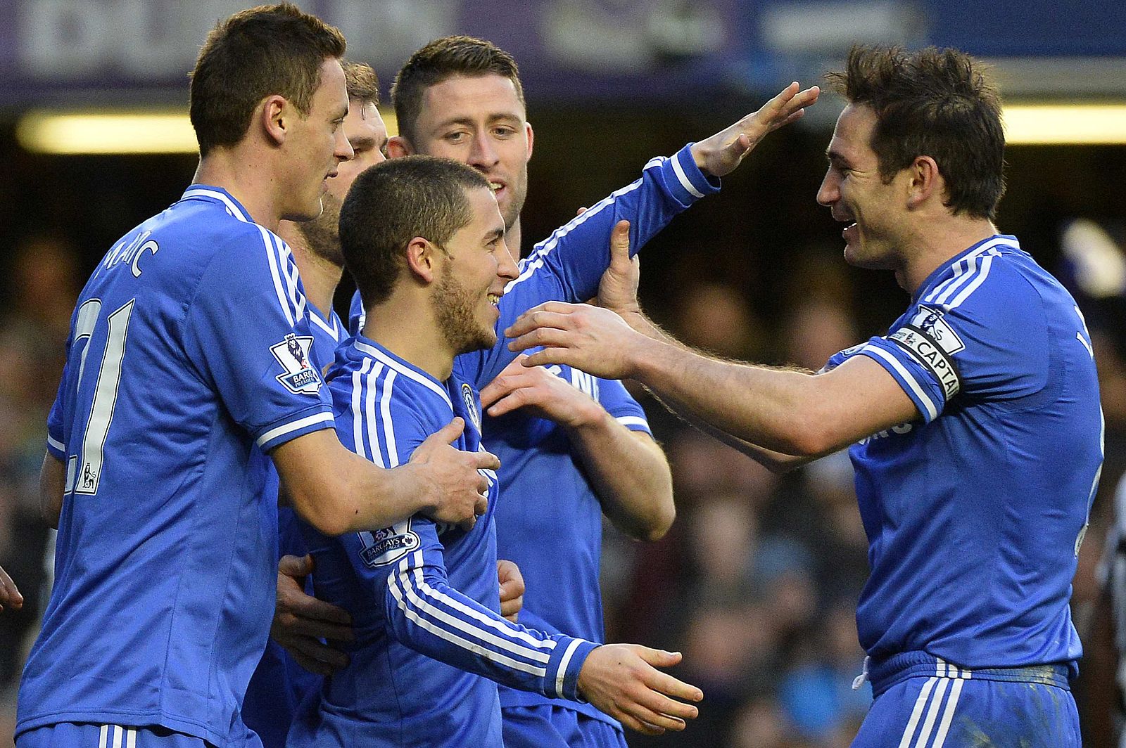 Chelsea's Hazard celebrates scoring his third goal with teammate Lampard against Newcastle United during their English Premier League soccer match in London