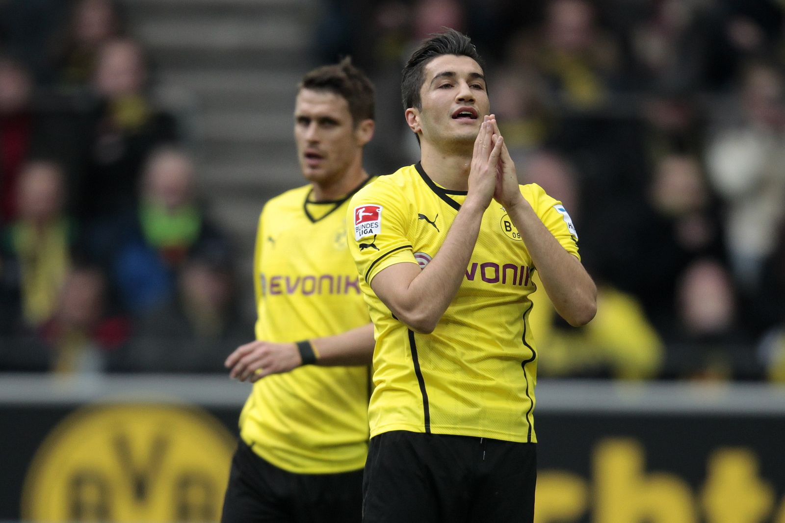 Borussia Dortmund's Kehl and Sahin react during the German first division Bundesliga soccer match against Borussia Moenchengladbach in Dortmund