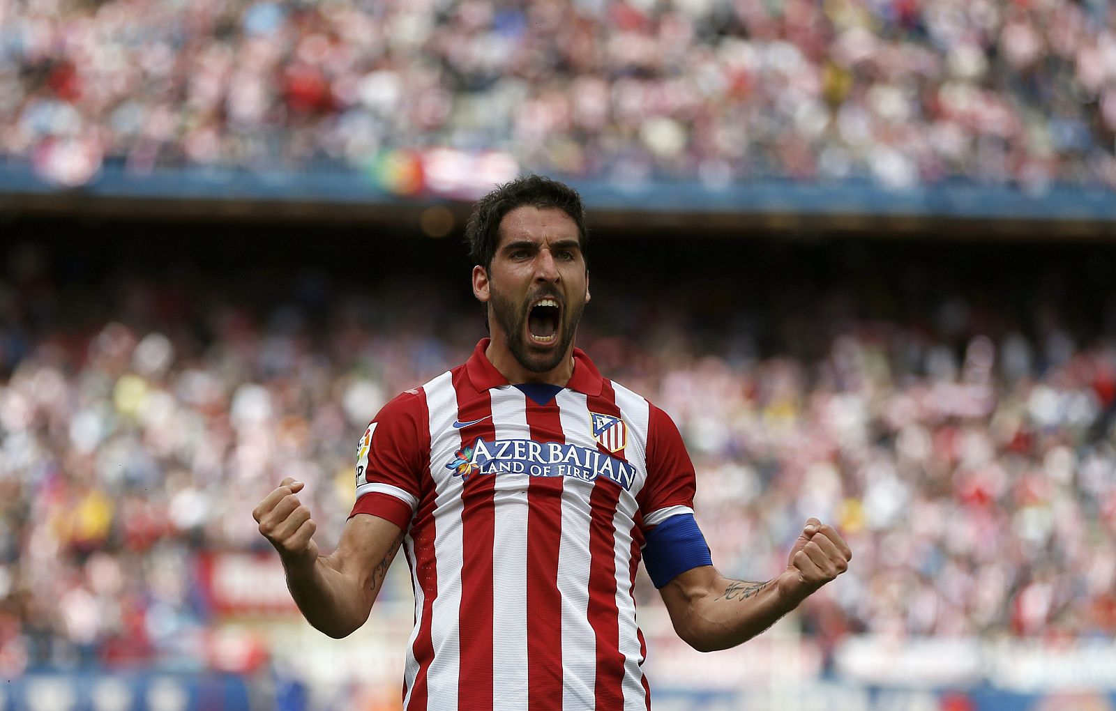 Atletico Madrid's Garcia celebrates after scoring a goal against Villarreal during their La Liga soccer match in Madrid