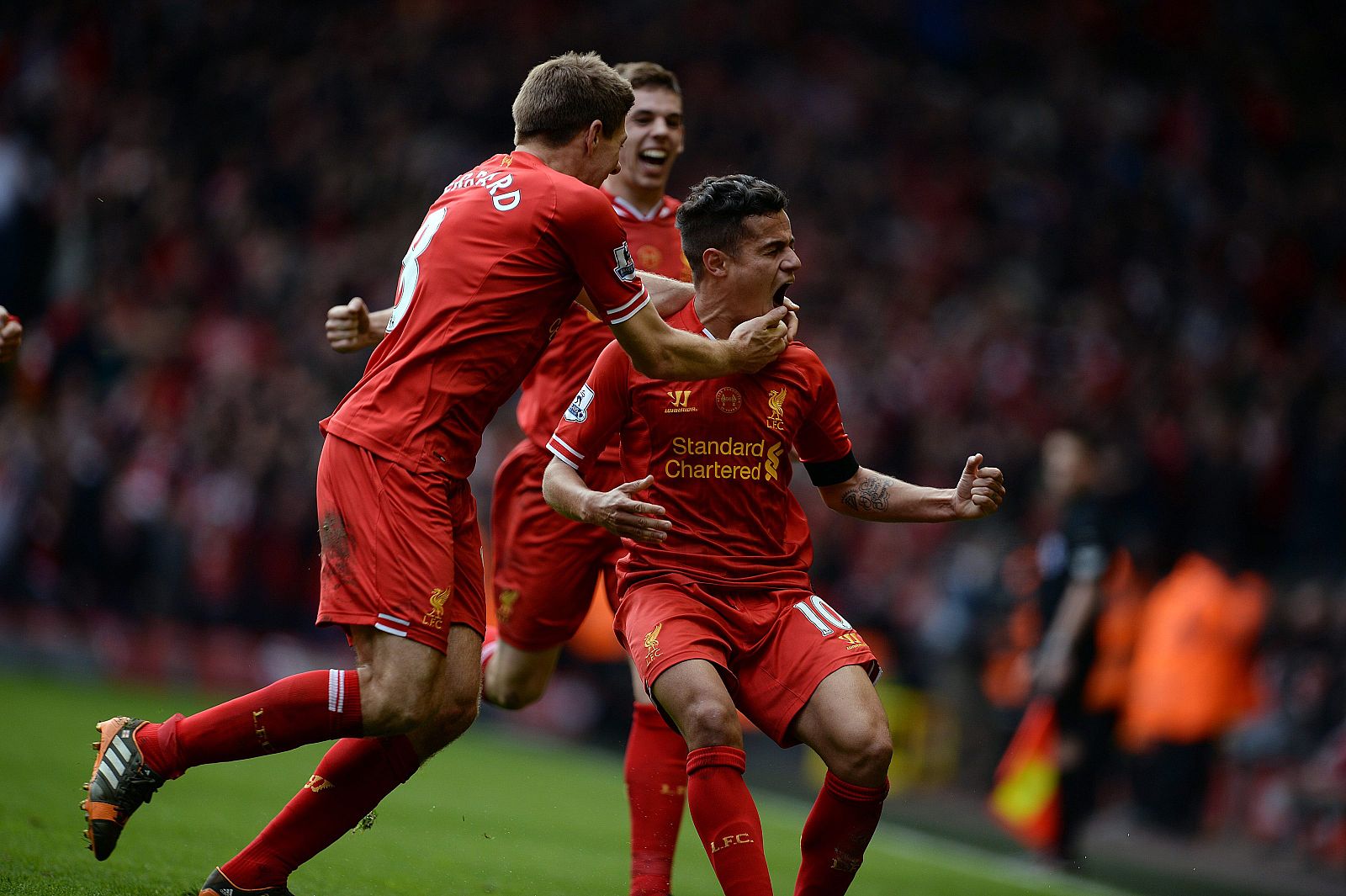 Liverpool's Courtinho celebrates scoring with Flanagan and Gerrard against Manchester City during their English Premier League soccer match at Anfield in Liverpool