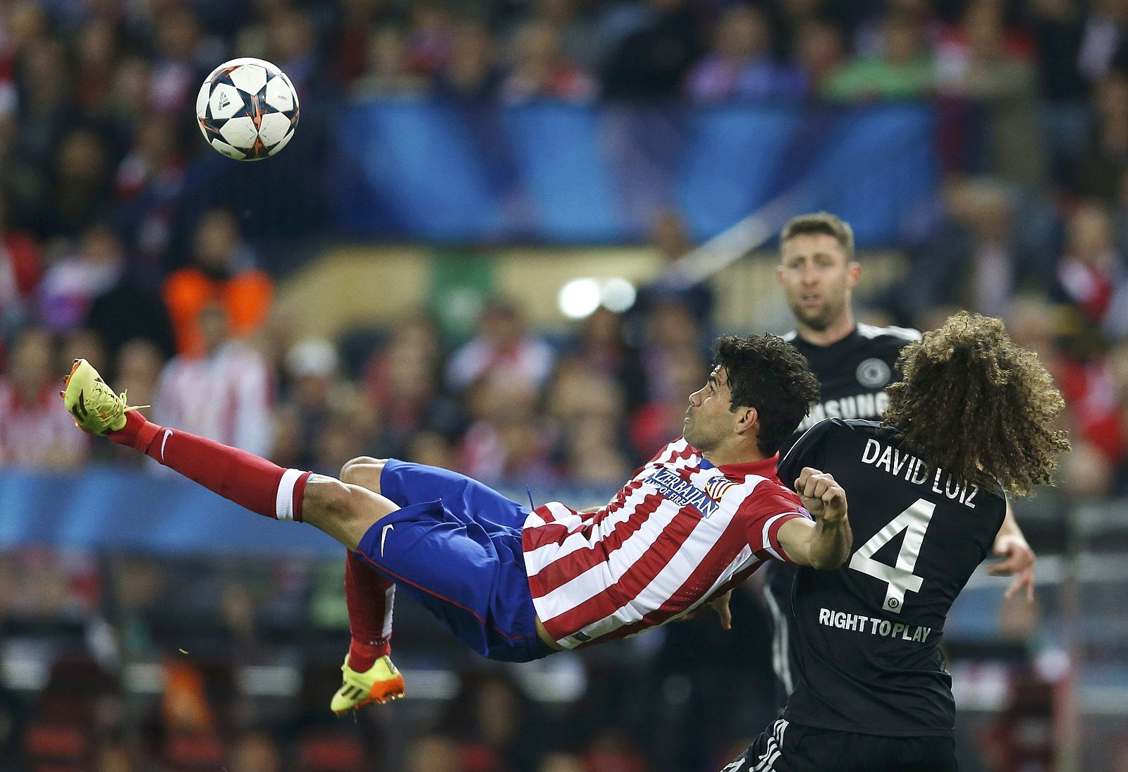 Atletico Madrid's Diego Costa lines up an overhead kick next to Chelsea's David Luiz during their Champion's League semi-final first leg soccer match at Vicente Calderon stadium in Madrid