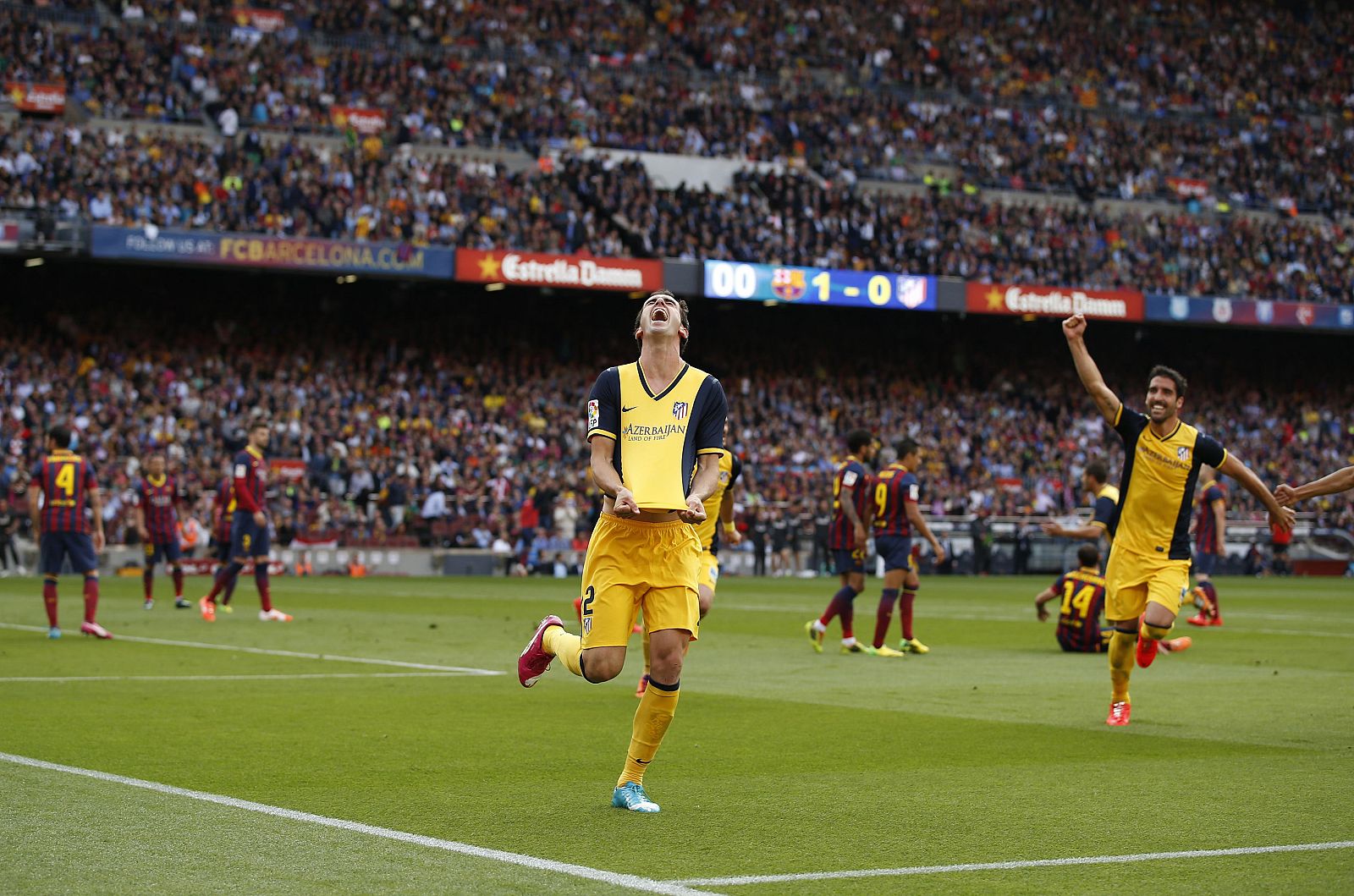 El uruguayo Godín celebra el gol del empate que vale una Liga en el Camp Nou.