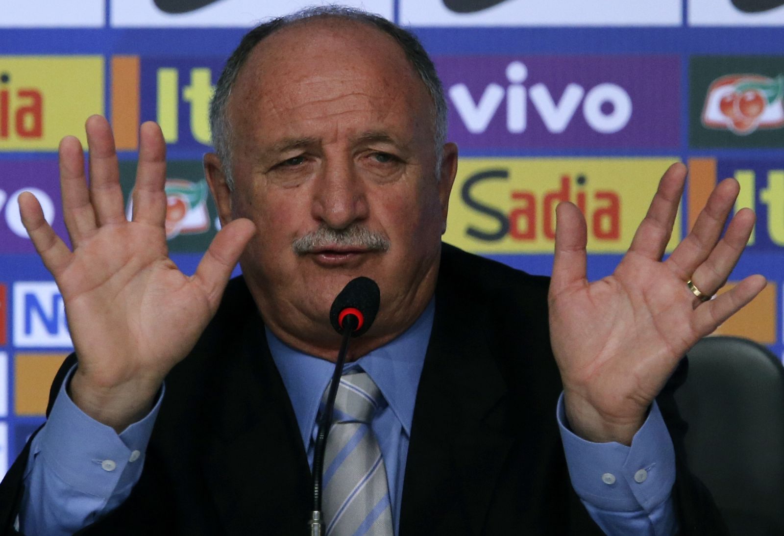 Brazilian national soccer team head coach Scolari gestures during a news conference in Rio de Janeiro