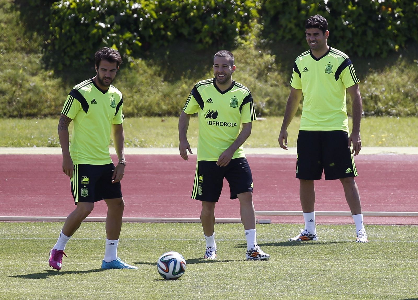 Spanish national soccer players Cesc Fabregas, Jordi Alba and Diego Costa attend a training session of Spain's national soccer team at Las Rozas playground near Madrid