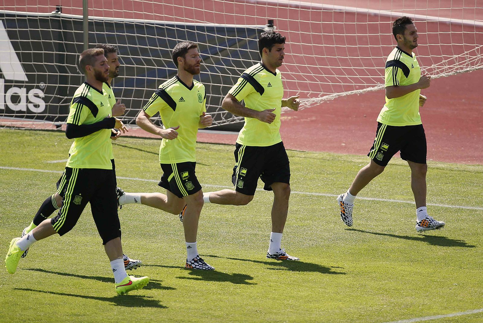Spanish national soccer players run during a training session at Las Rozas playground near Madrid