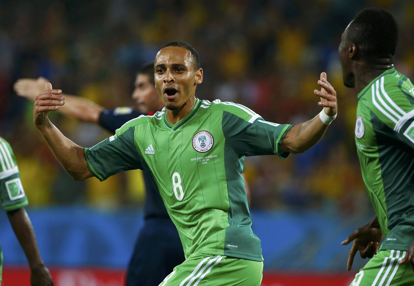 Nigeria's Odemwingie celebrates scoring his goal against Bosnia during their 2014 World Cup Group F soccer match at the Pantanal arena in Cuiaba