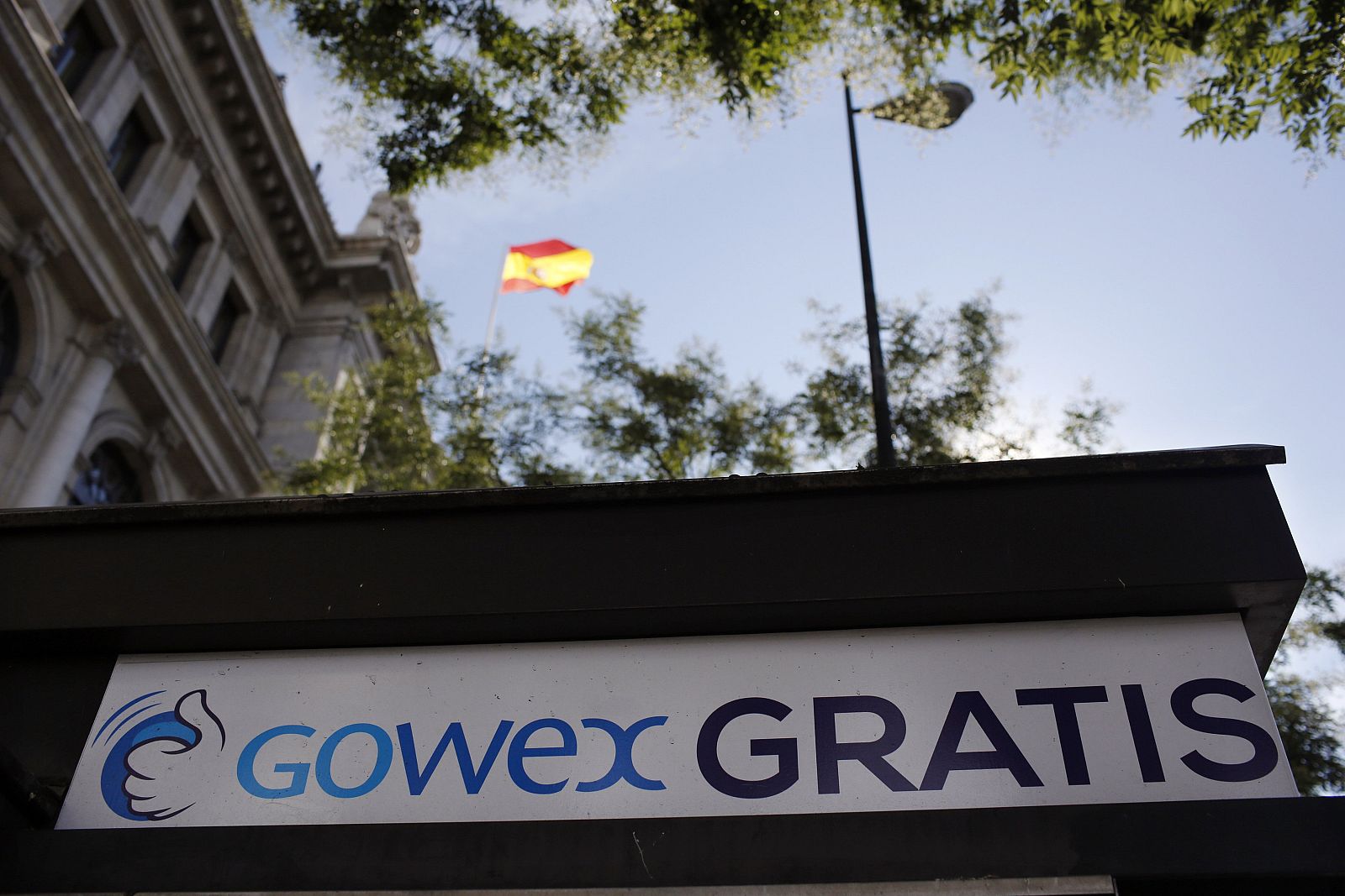A sign advertising Spanish wireless networks provider Gowex is seen outside the Bank of Spain in Madrid