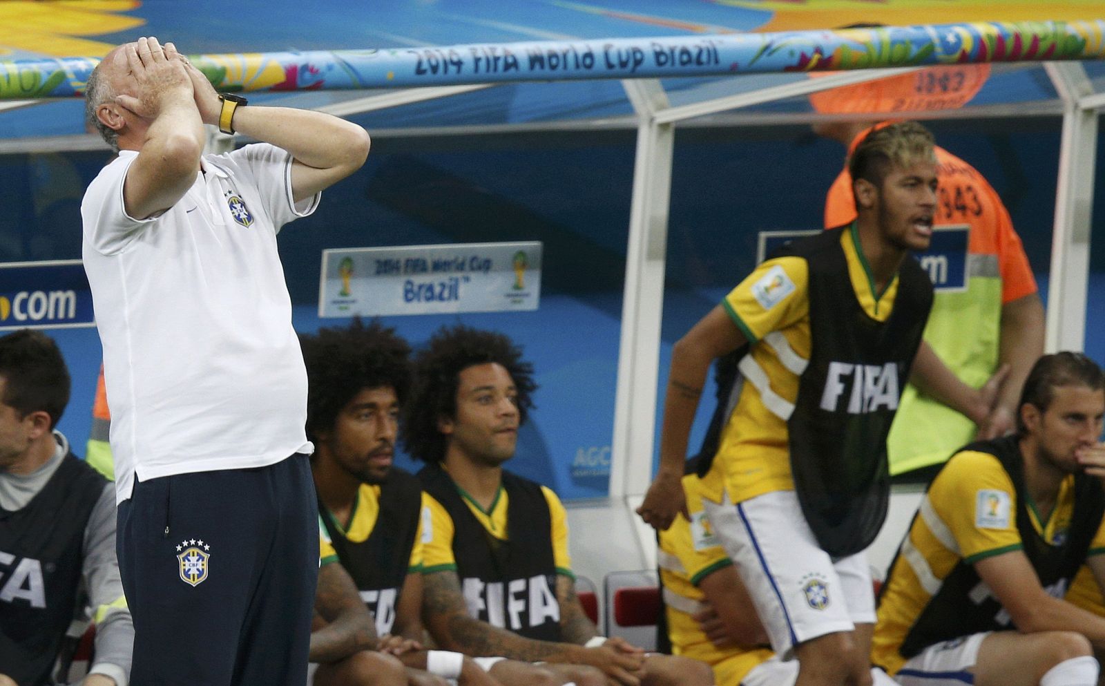 Brazil's coach Luiz Felipe Scolari reacts as his team plays against the Netherlands during their 2014 World Cup third-place playoff at the Brasilia national stadium in Brasilia