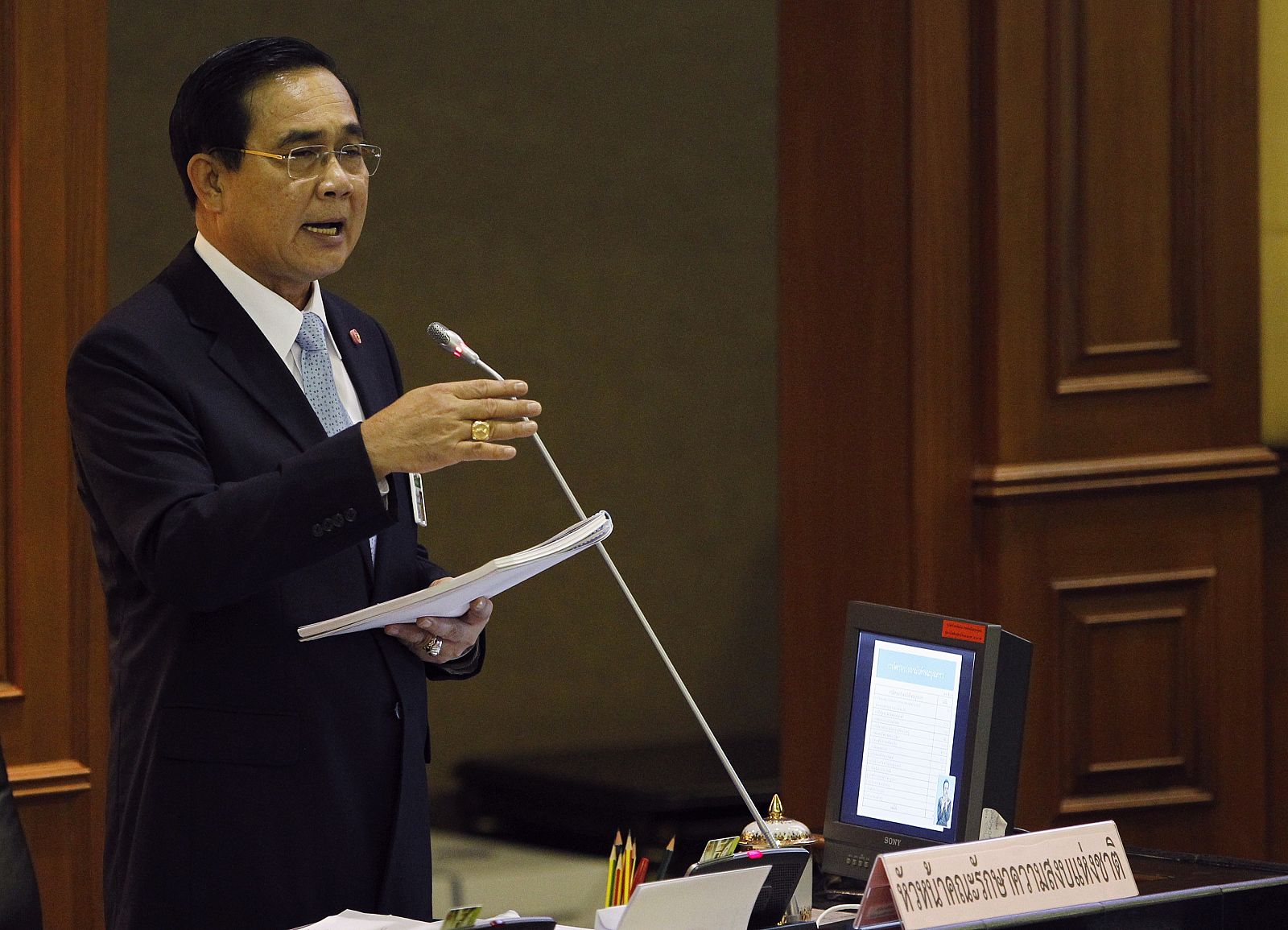 Thai Army chief General Prayuth Chan-ocha speaks during the start of a National Legislative Assembly meeting to consider urgent matters including the 2015 Budget Bill, at the parliament in Bangkok