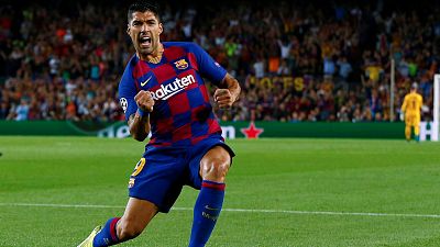 El Barça frustra al Inter con un doblete de Suárez