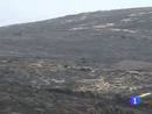 Telediario 1 - Calles anegadas y fuegos sofocados