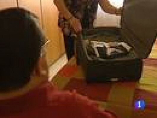 Telediario 1 - Maletas puerta a puerta