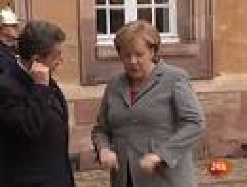 Merkel y Sarkozy acercan posturas en las sanciones a los Estados y el BCE antes de su reunión 