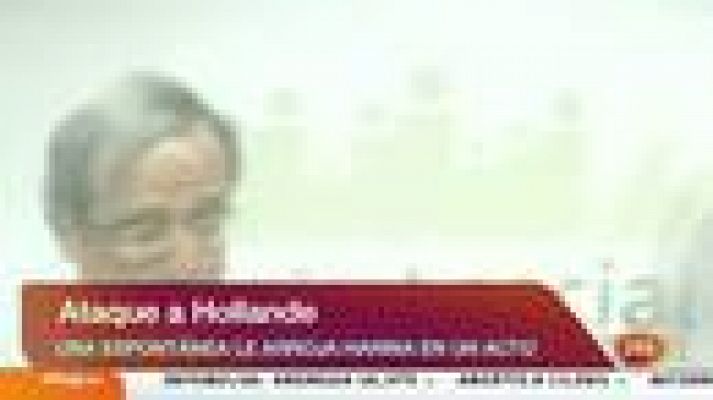 Informativo 24h - Una espontánea embadurna de harina al socialista Hollande en un acto público