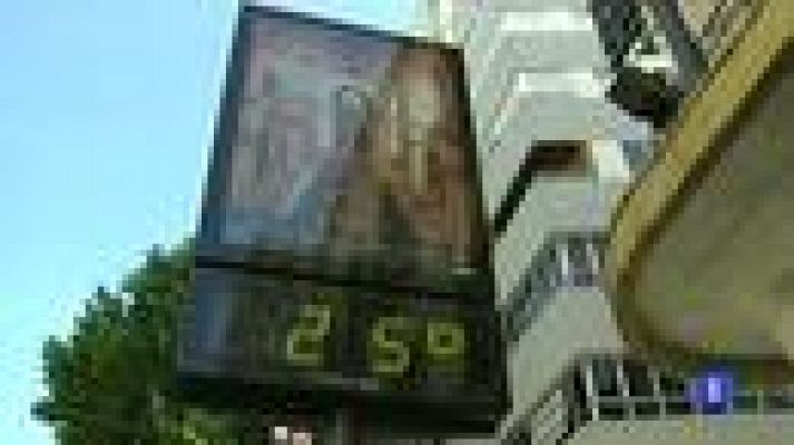 Telediario 1 - Del abrigo a las sandalias