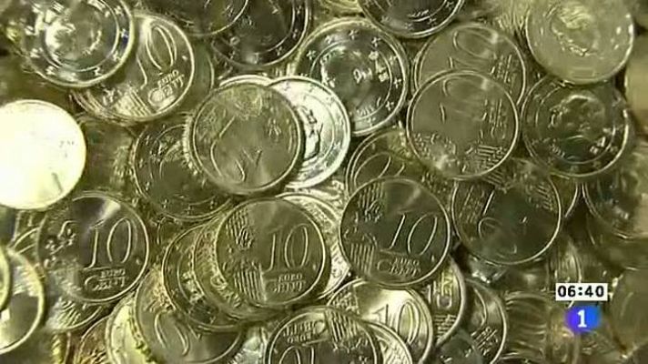 Telediario 1 - España acude al mercado el día en que publica la auditoría a la banca y negociará su rescate