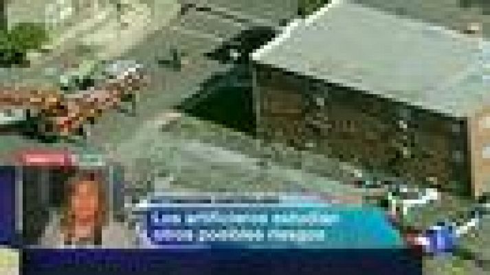 Telediario 1 - Entran en casa del asesino de EEUU