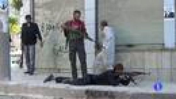 Telediario 1 - Fuerzas del régimen y rebeldes se enfrentan cerca de la sede del Gobierno sirio tras un atentado
