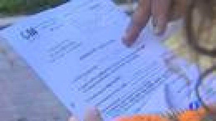 Telediario 1 - Inmigrantes acuden a informarse