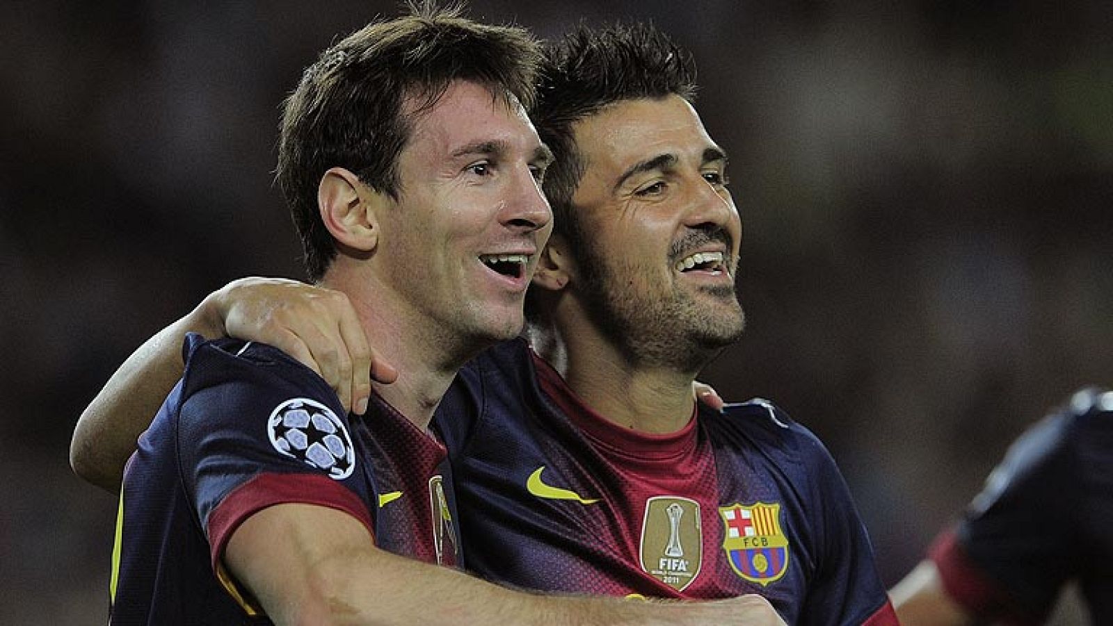 Messi y Villa discuten ante el Granada