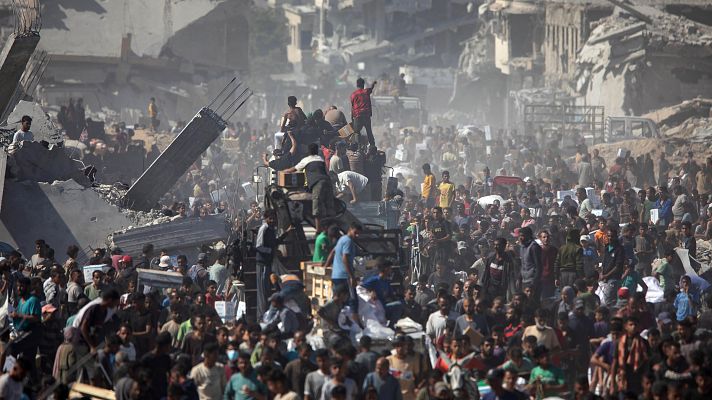 Telediario Fin de Semana - Los gazatíes se abalanzan sobre los primeros camiones con ayuda tras el acuerdo