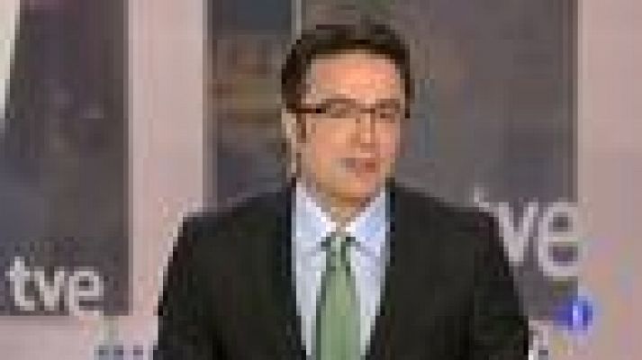 Telediario 1 - El asteroide 2012 DA14 pasa a 27.860 KM de la Tierra y sigue de largo