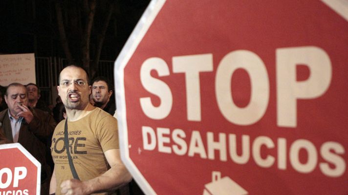 Telediario 1 - Cáritas analiza a los deshauciados