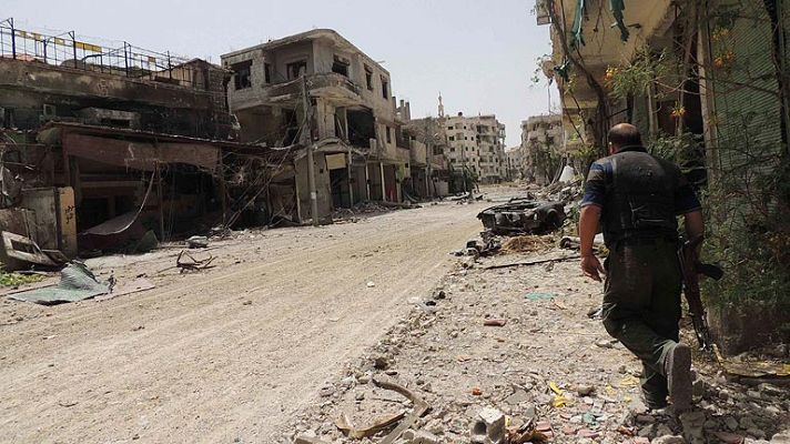 Telediario 1 - UE levanta embargo a Siria