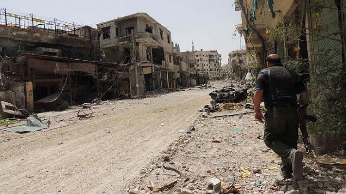 Telediario 1 - UE levanta embargo a Siria