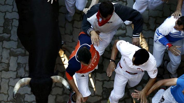 San Fermín - Uno de los mozos toca asta