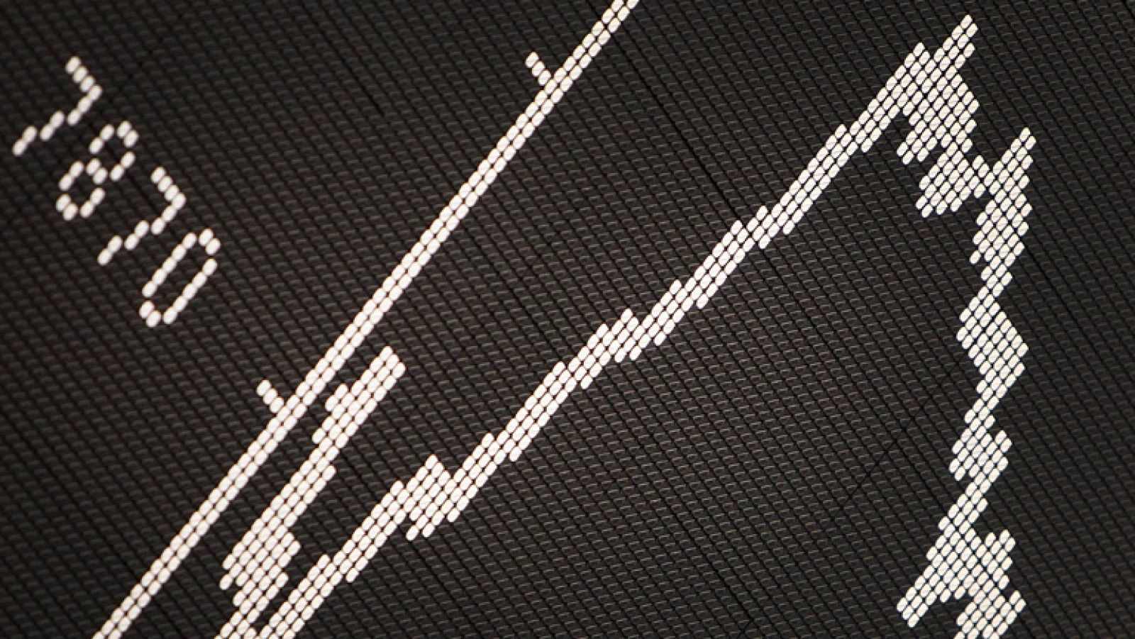 La prima de riesgo española cierra en 316 puntos básicos por el recorte a la deuda de Italia | Ver