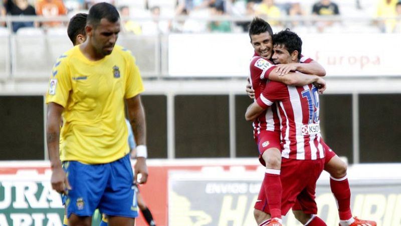 El Atlético de Madrid ha cerrado con victoria la pretemporada frente al U.D. Las Palmas (0-2), en un encuentro disputado en el estadio Gran Canaria, gracias al inmejorable debut de David Villa que se ha estrenado con el conjunto rojiblanco con un 'go