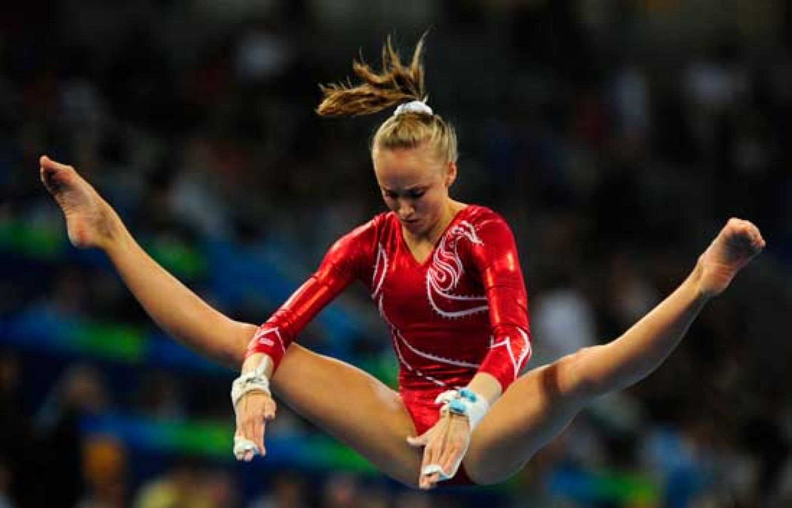 Excepcional ejercicio de barras asimétricas de Nastasia Liukin | Ver