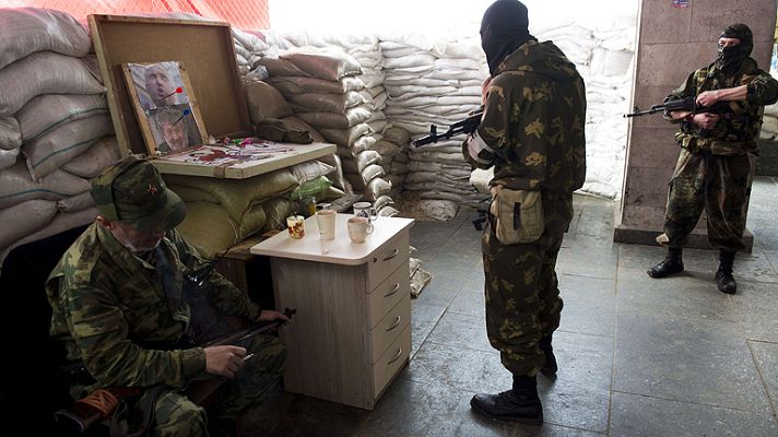 Telediario 1 - Hollande y Merkel piden que se cree un mecanismo de control del alto el fuego en Ucrania