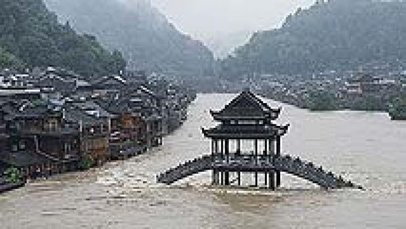 Inundaciones en el sur de China, que espera al tifón Rammasun tras su paso por Filipinas