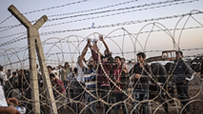 Telediario 1 - Más de 100.000 refugiados llegan a la frontera de Turquía