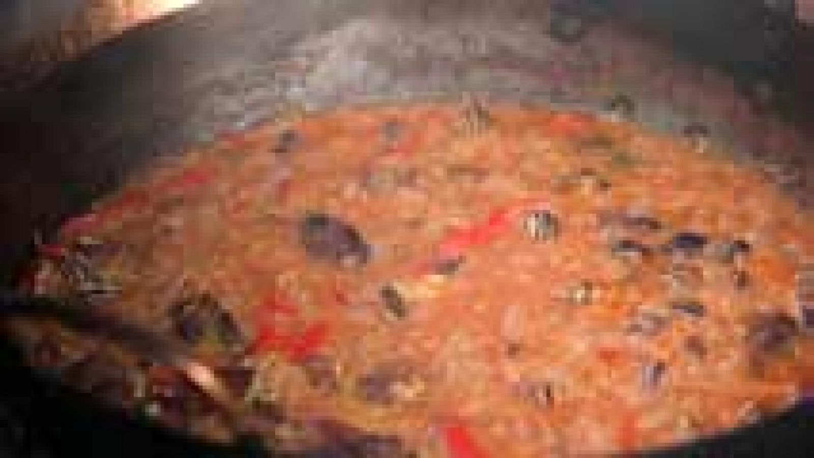 Arroz y conejo con caracoles serranos