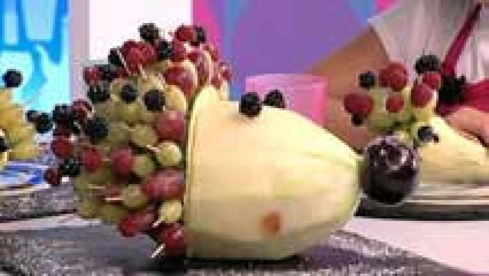 Puercoespín de pera con permanente de uvas