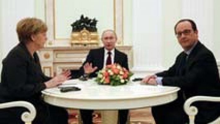 Telediario 1 - Merkel y Hollande negocian con Putin