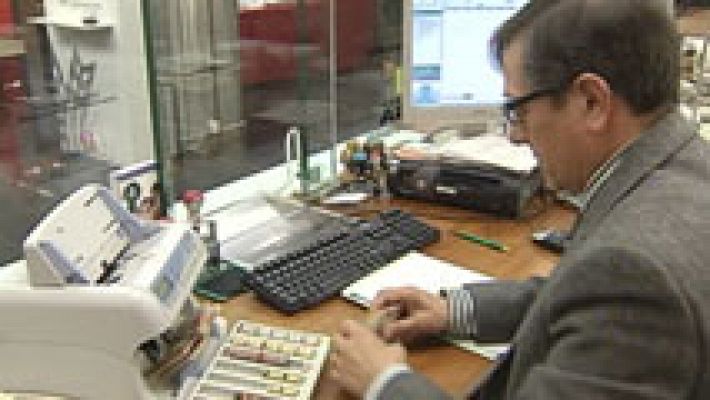 Telediario 1 - La banca negocia un nuevo convenio para el sector