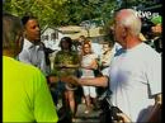  - Obama hace campaña puerta a puerta