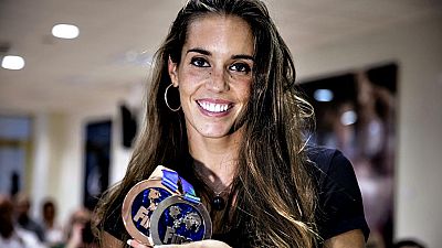 Ona Carbonell, doble medallista en los Mundiales de nataci�n de Kaz�n (Rusia), afirm� en un acto celebrado este lunes en el Consejo Superior de Deportes con j�venes de la nataci�n sincronizada espa�ola, que la cita mundialista ha sido "dif�cil para t