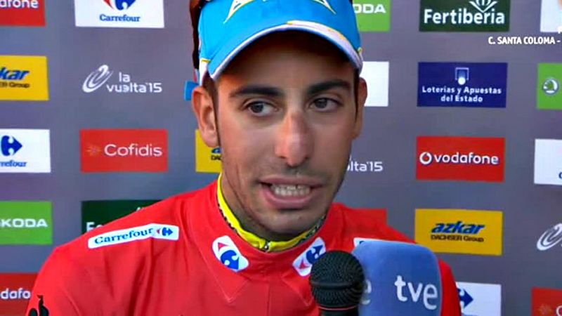 El italiano Fabio Aru (Astana) se ha convertido en el virtual  ganador de La Vuelta a España tras protagonizar una espectacular  remontada, gracias a su equipo, ante el holandés Tom Dumoulin  (Giant), en una vigésima y penúltima etapa, disputada sobr
