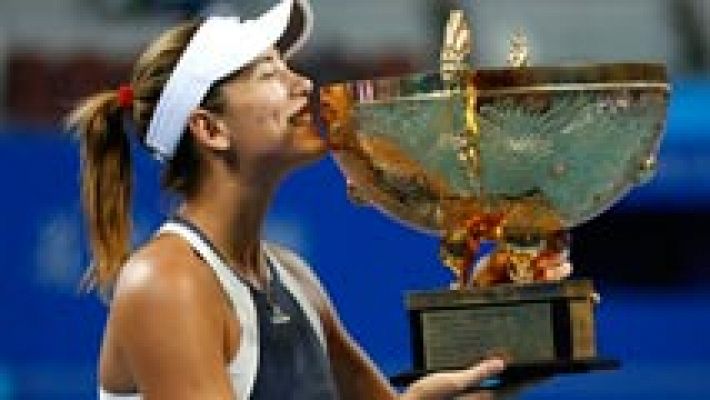 Muguruza brilla en Pekín remontando en la final a Bacsinszky