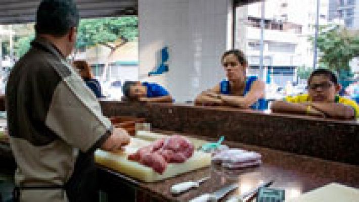 Telediario 1 - Los problemas energéticos de Venezuela provocan la reducción de las horas de apertura de los comercios