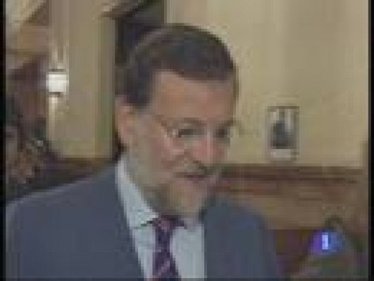  - Rajoy pide a Zapatero "un plan"