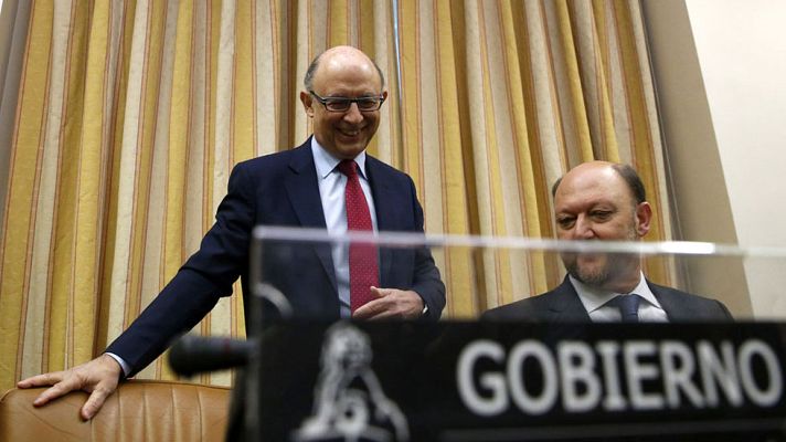 Telediario 1 - El Gobierno revisa a la baja el déficit público de 2015 al 5%